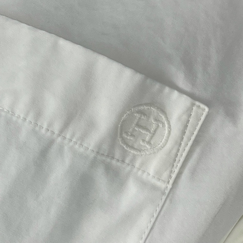 Authentic Hermès white asymmetrical dress.